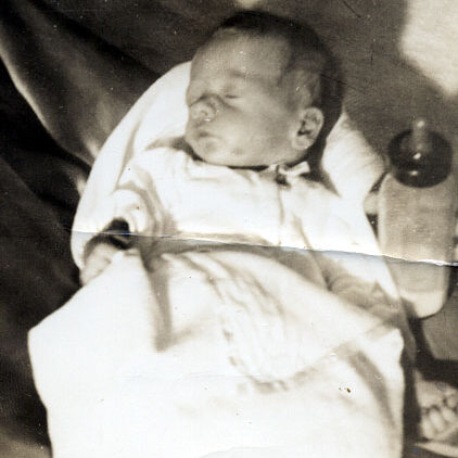 Infant Billy Windsor with giant bottle October 1948.