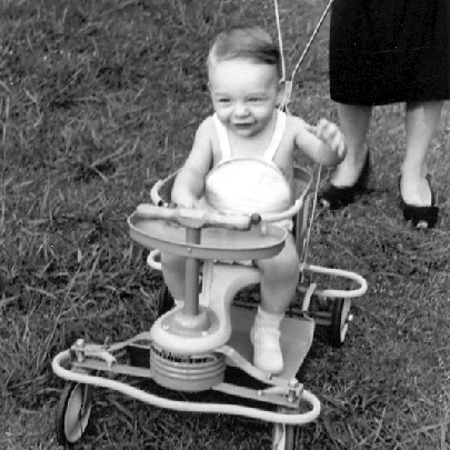 Billy Windsor being pushed in stroller by mother Mary Windsor in 1949