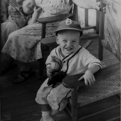 Billy Windsor in his baseball suit on Grandma Johnson's porch in Danville Virginia